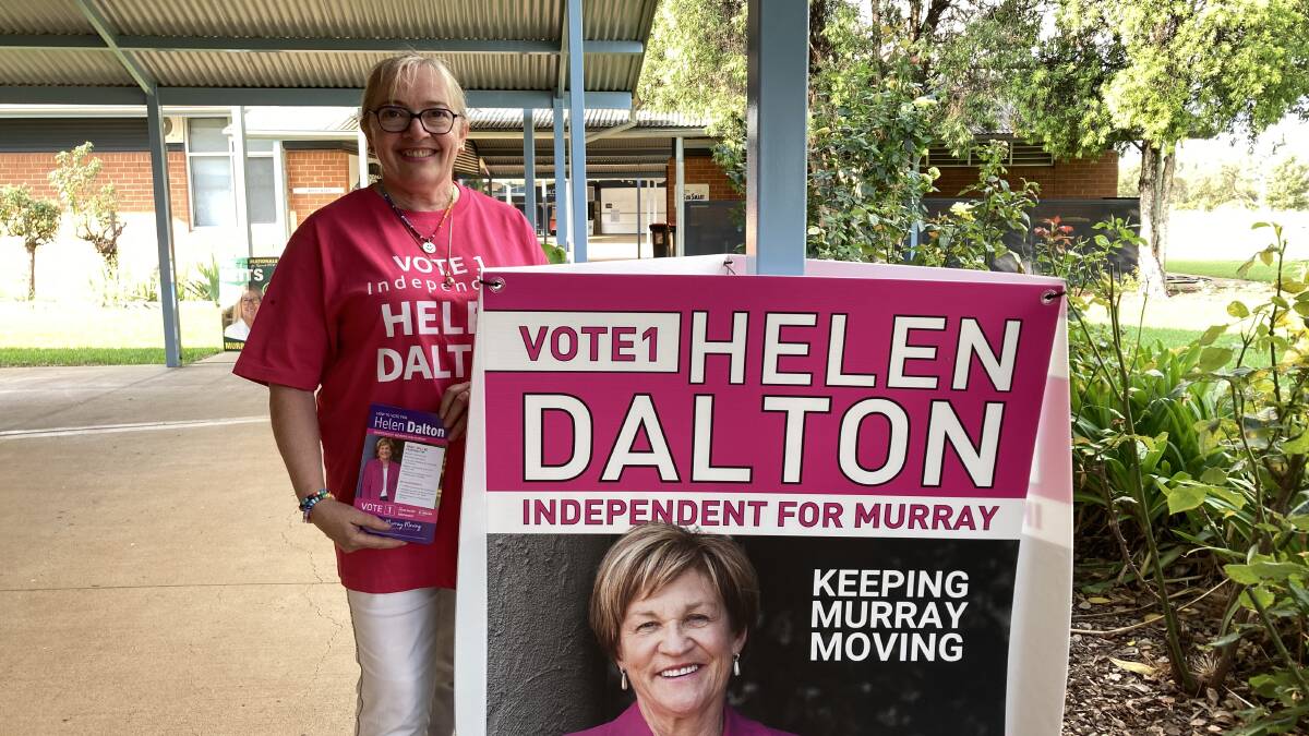 Carolyn Groat in Yenda, handing out how-to-votes for Helen Dalton. Photo by Cai Holroyd