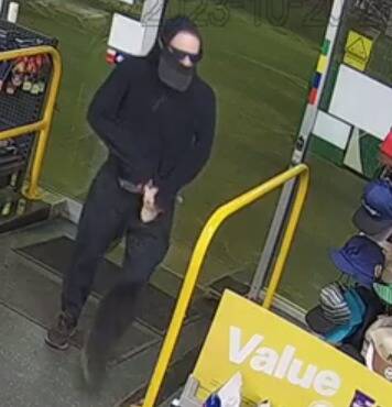 Police are searching for a man who allegedly threatened a staff member at a Griffith petrol station with a gun. Picture supplied.