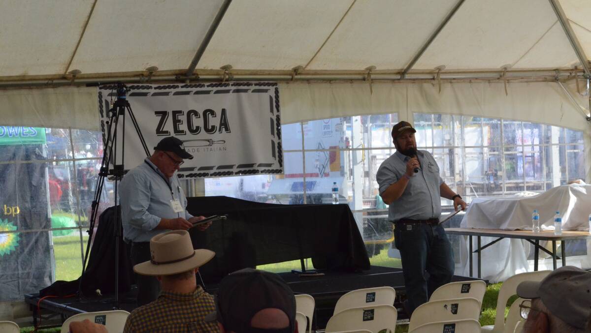 Joe Wilks deftly running the water auction at the Riverina Field Days. Photo by Cai Holroyd