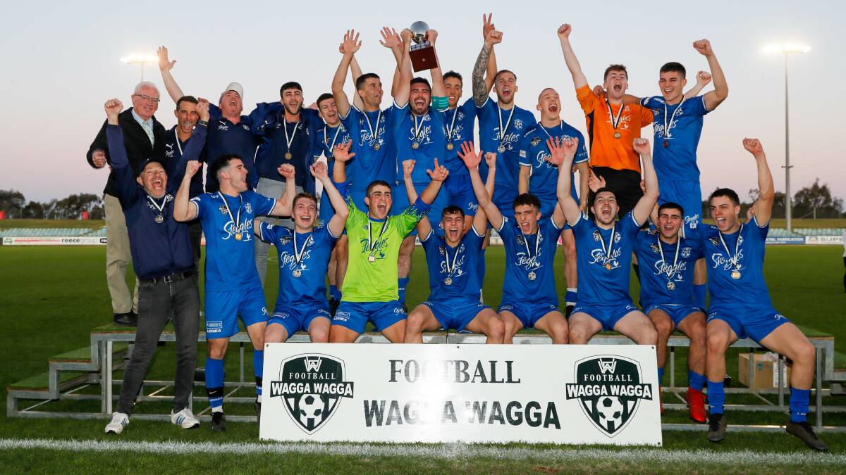 Hanwood celebrate their Pascoe Cup grand final win over Tolland on Sunday night. Picture by Les Smith