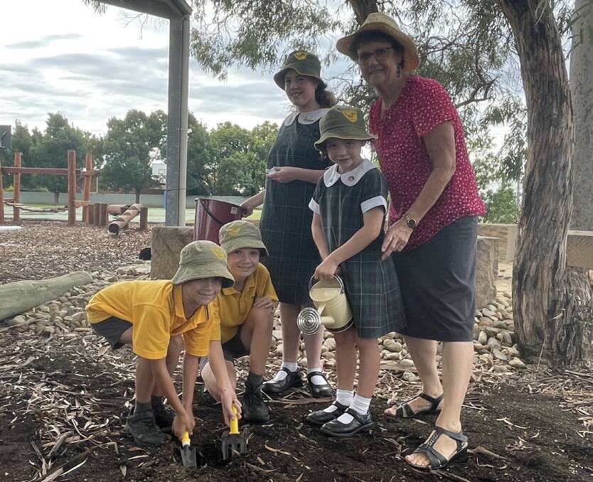 Yoogali Public School students Jake Brennick, Nate Anderson, Tiah Wigg, and Zaylee Curphey with Food and Garden teacher Julie Campbell. All are looking forward to Thursday's field day. Picture by Allan Wilson