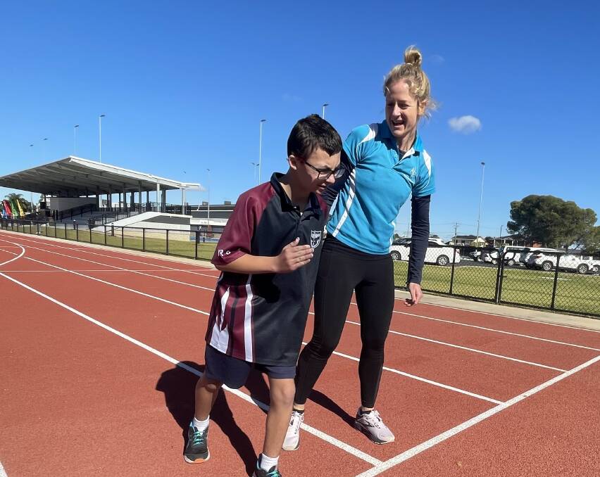 Coach Alex Marchese coaching St Marys para-athlete William Johnston at the Griffith Regional Sports Centre recently. Picture by Allan Wilson