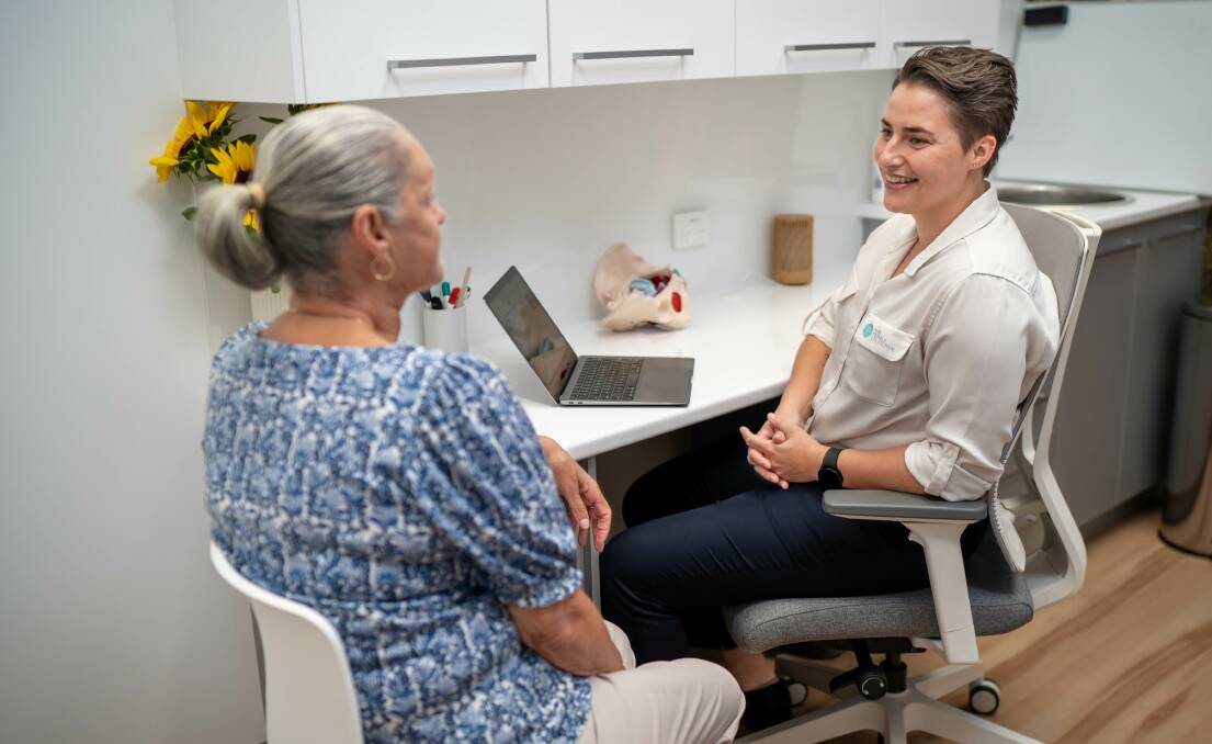 Ms Stoll chatting with one of her patients. Picture, controbuted