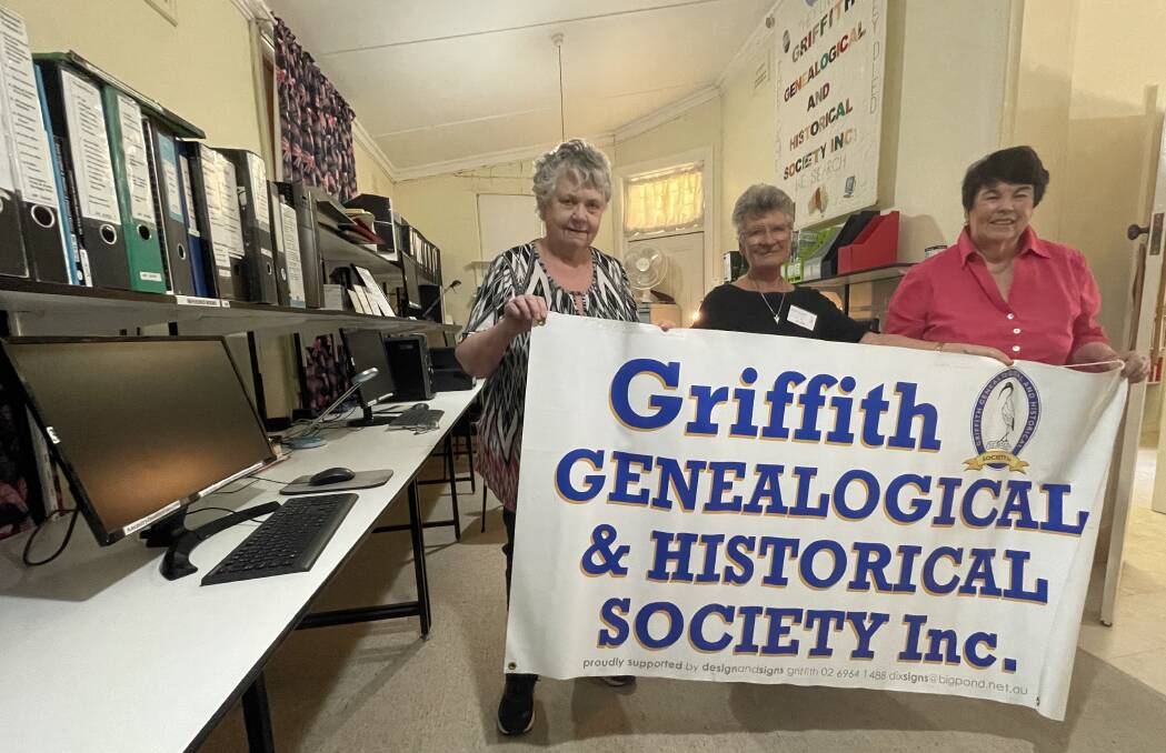 Membership Secretary Margaret Tucker, Vice President Sue Wade and President Christine Gavin proudly display the Griffith Genealogical and Historical Society logo at the offices on Banna Avenue. The society is closing after 42 years. Picture By Allan Wilson