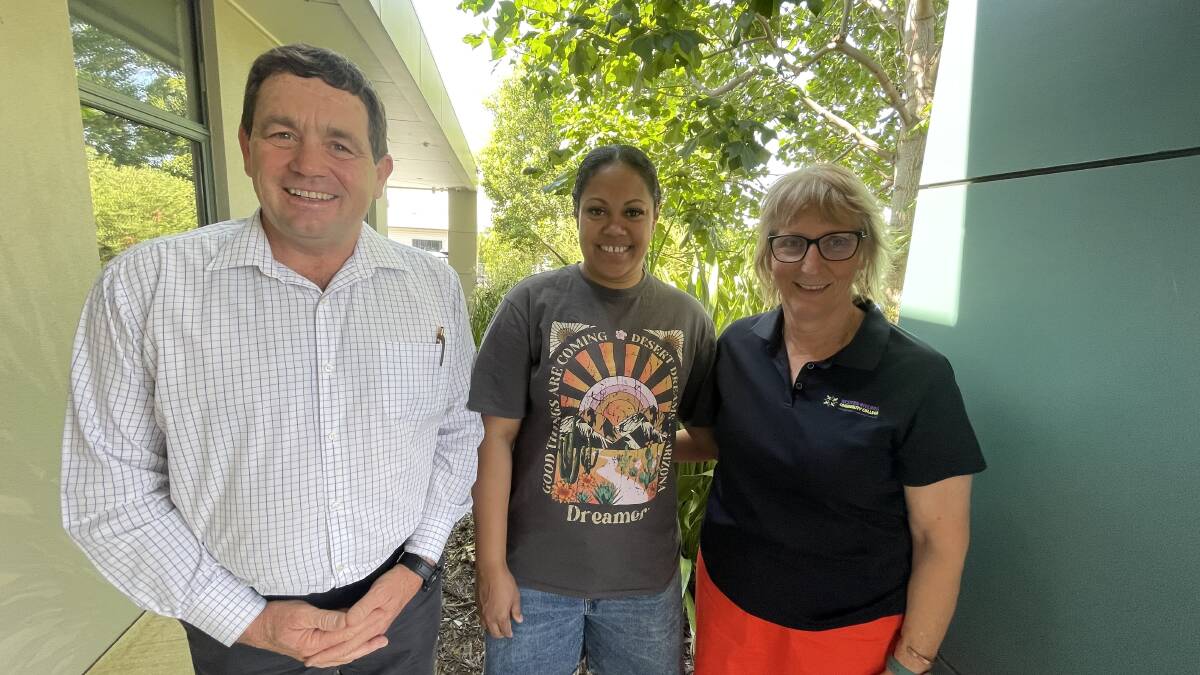 Western Riverina Community College CEO David Martin with Community Colleges Australia Community Education Student of the Year Veniana Tarovia and Vocational education training manager Sue Reynolds. Picture by Allan Wilson