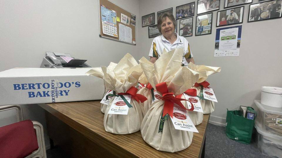 Can Assist president Olga Forner with an array of the puddings created by Bertoldo's Bakery. Picture by Allan Wilson