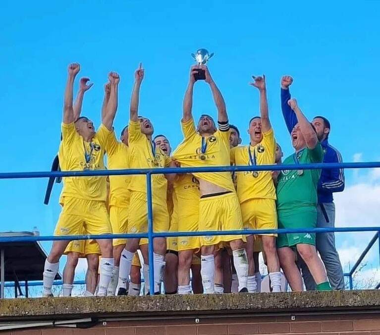 Yoogali FC hold the cup aloft after taking down West Griffith in the GDFA first grade grand final. Picture supplied